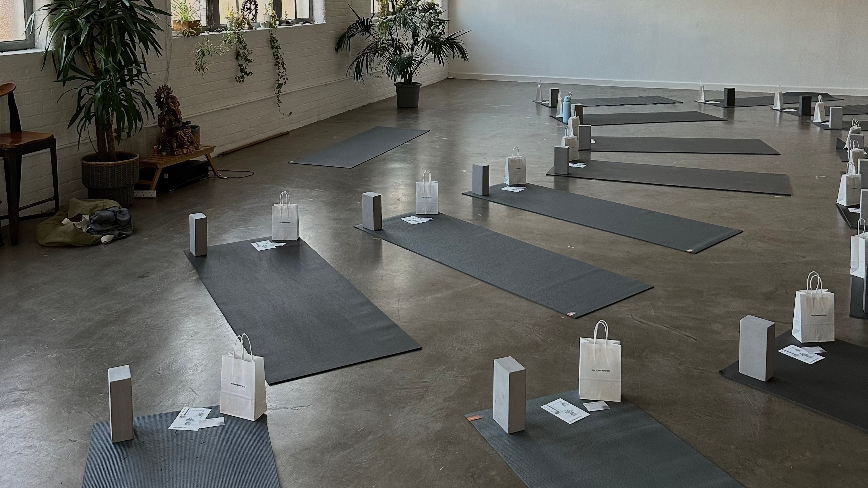 Yoga studio set up for wellness networking event.